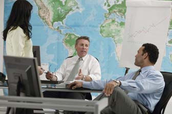Emergency management director in a classroom with volunteers