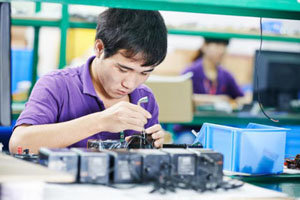 Technician fixing computers